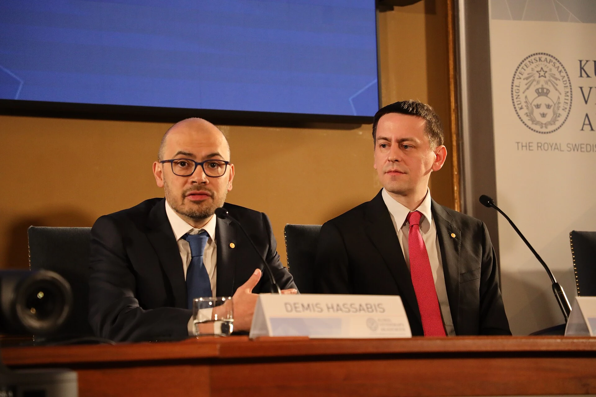 DeepMind scientists Demis Hassabis and John Jumper at a Nobel Prize press conference