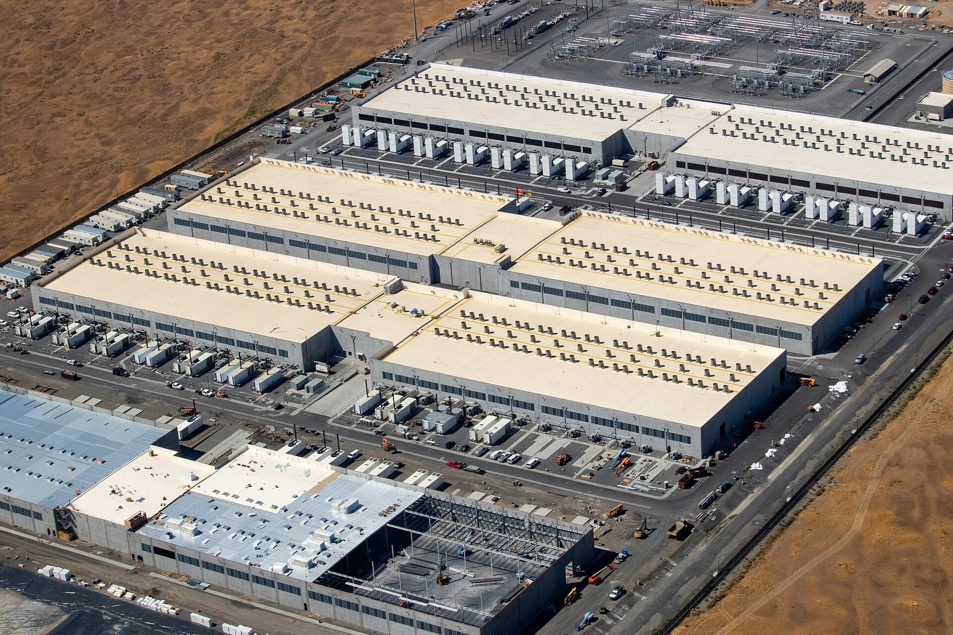 Aerial view of three AWS data centers and a fourth under construction in Oregon