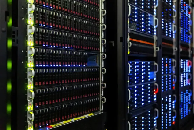 Rows of storage and computing equipment in a NOIRLab server room.
