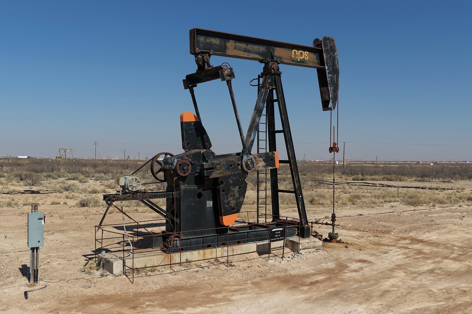 A pumpjack operating in dry terrain near Monahans, Texas