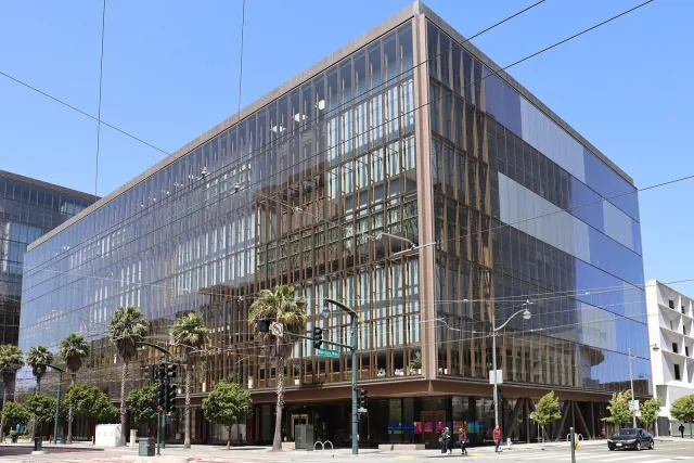 A glass and metal office building on Third Street in San Francisco