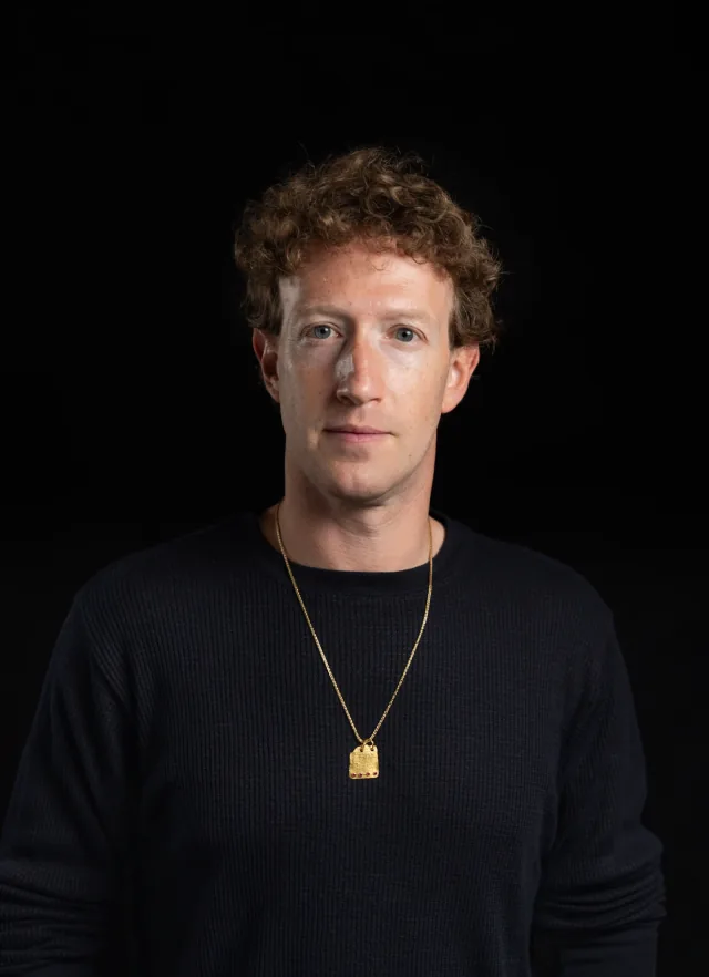 Mark Zuckerberg in a dark sweater against a black background.