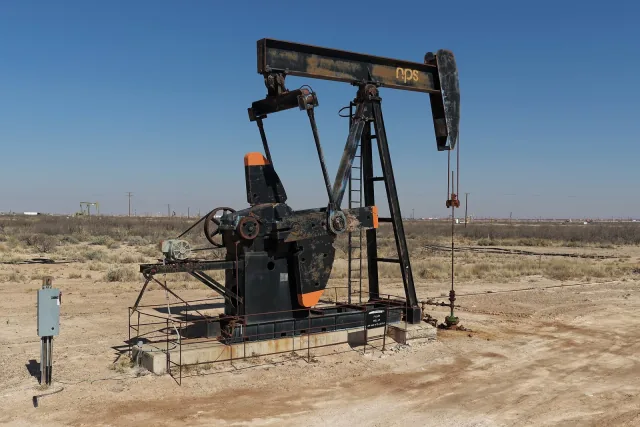 A pumpjack operating in dry terrain near Monahans, Texas